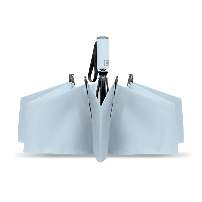 Light blue umbrella with a black handle on a white background