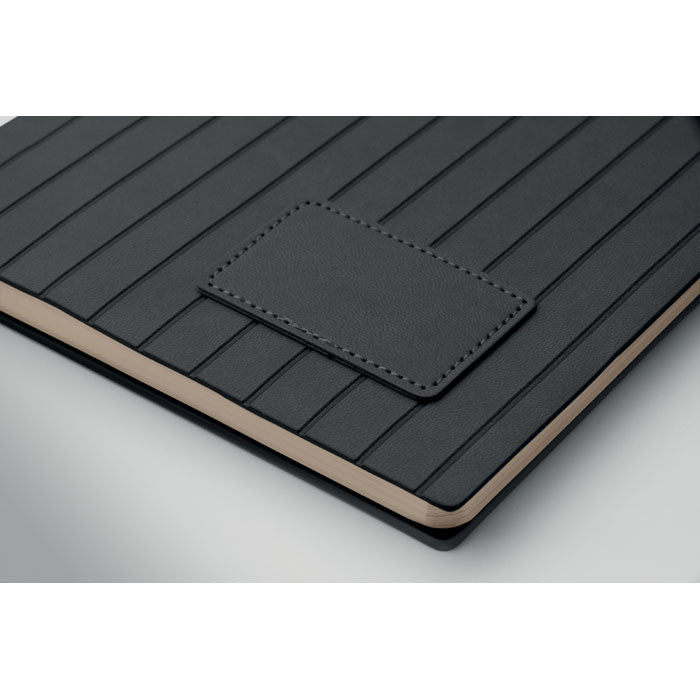 Black textured mat with a pocket on a white background