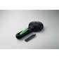 Black handheld hair dryer with green handle on a gray background