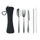 Set of silver cutlery with a black case on a white background