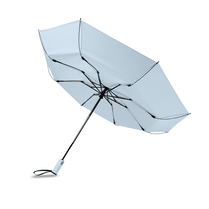 Light blue umbrella with black ribs on a white background