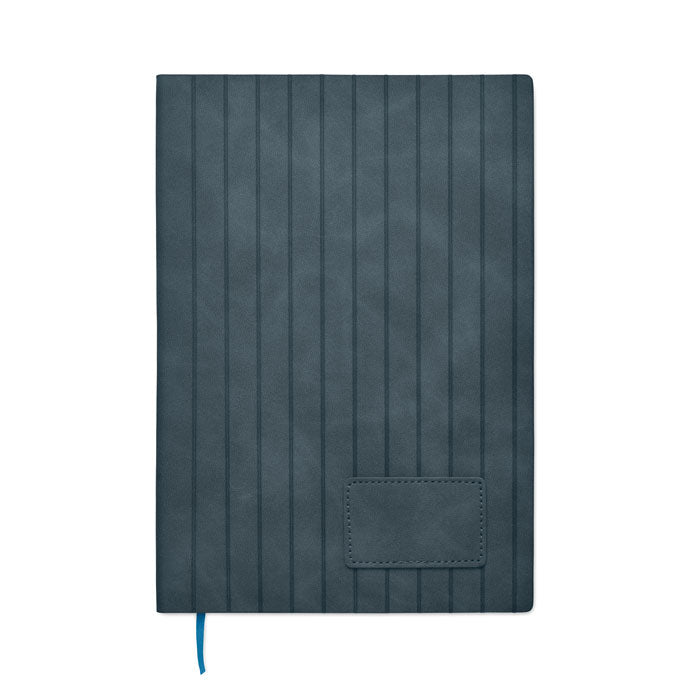 Dark blue textured notebook with a pocket on a white background
