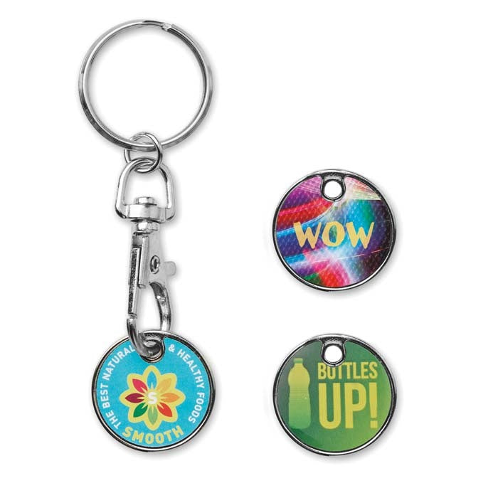 Keychain with three round tags featuring colorful designs and text on a white background