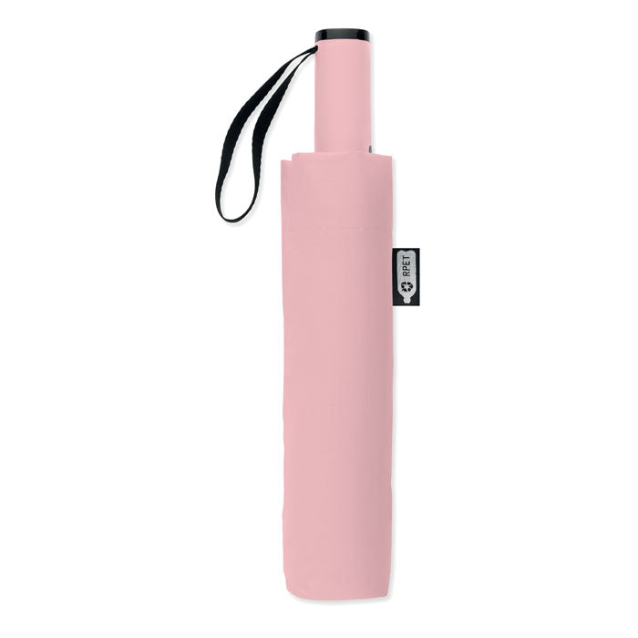 Pink umbrella with a black handle on a white background