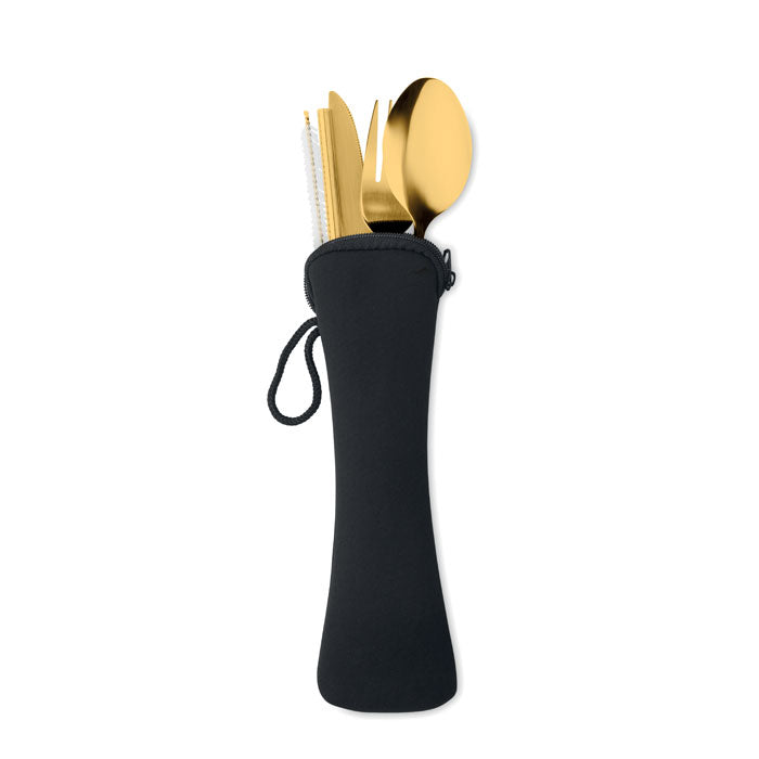 Gold cutlery set with black pouch on a white background
