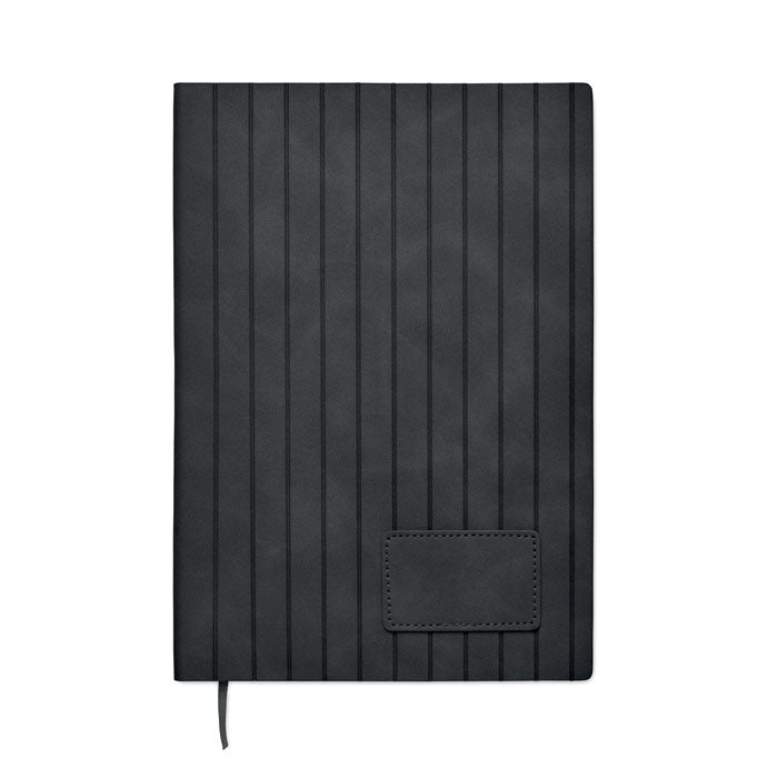 Black notebook with textured cover and pocket on a white background