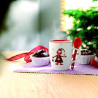Branded Santa mug with spoon, in use