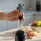 Branded Christmas bottle stopper, in use