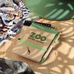 Branded A6 Recycled Paper Notebook with Pen in use
