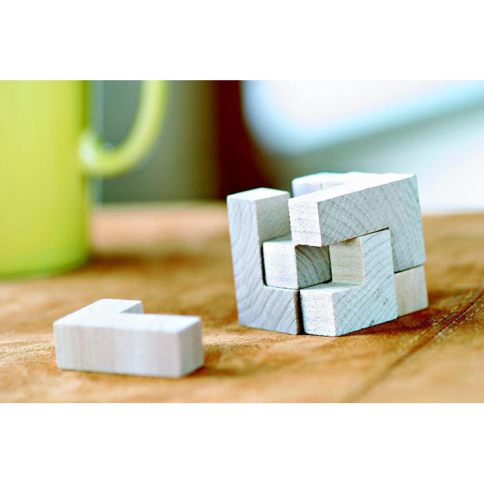 Branded Wooden Cube Puzzle in Cotton Pouch in use