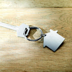 Branded Brushed Metal House Key Holder in use
