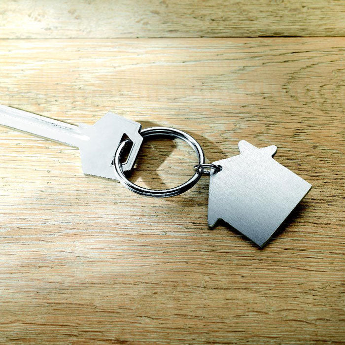 Branded Brushed Metal House Key Holder in use