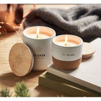 Branded Fresh Linen Candle in Stoneware Jar with Cork Base in use