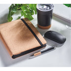 Branded A5 Cork Portfolio with Pen in use