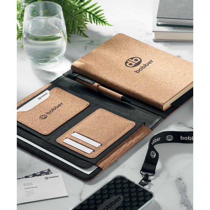 Branded A5 Cork Portfolio with Pen in use