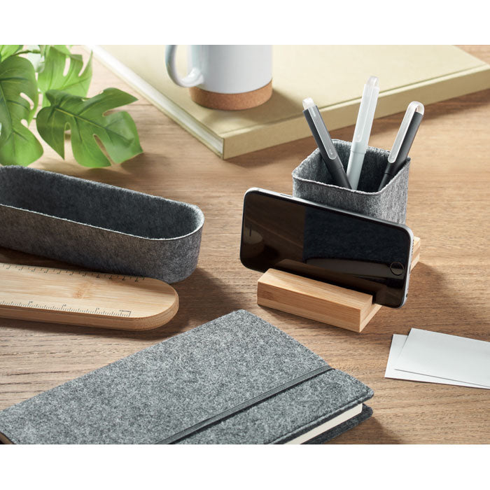 Branded Bamboo Phone Stand with Felt Pen Holder in use