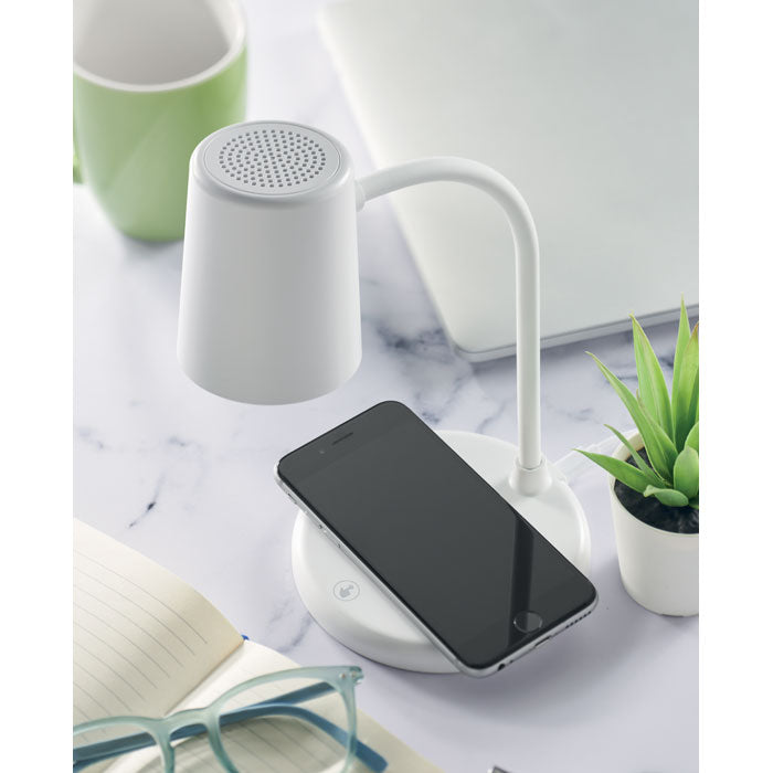 Branded Wireless Phone Charging Office Lamp with Speaker in use