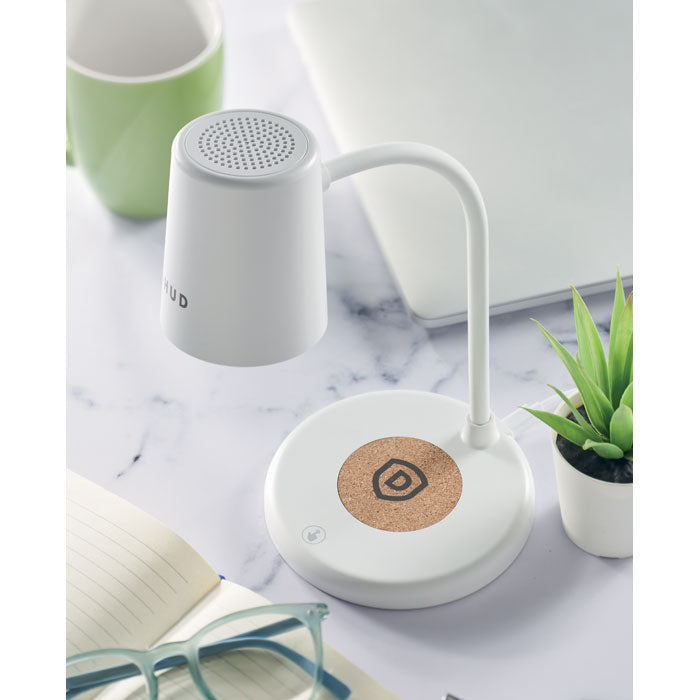 Branded Wireless Phone Charging Office Lamp with Speaker in use