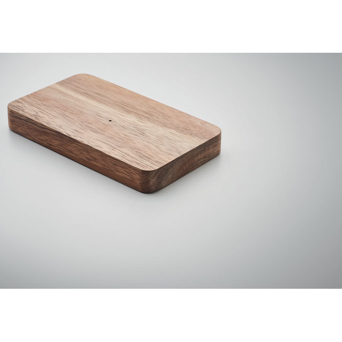 Branded Acacia Wood Wireless Power Bank in use