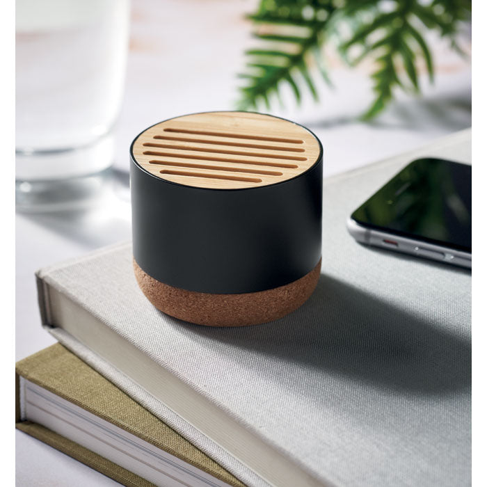 Branded Cork and Aluminium Wireless Speaker in use
