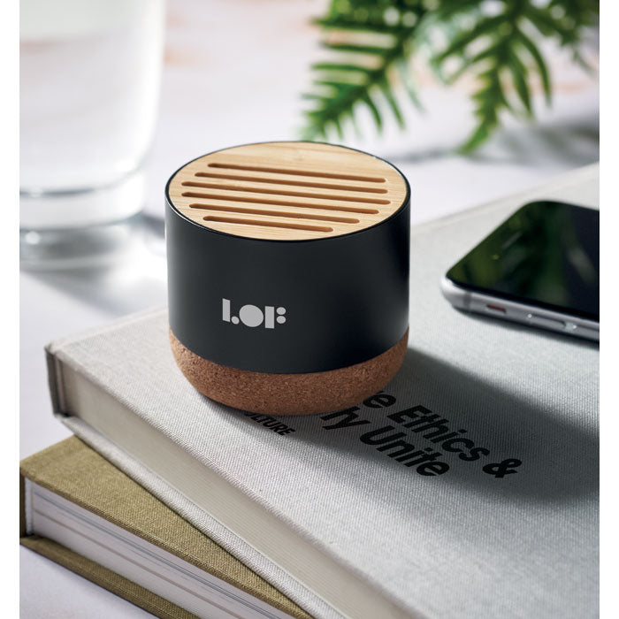 Branded Cork and Aluminium Wireless Speaker in use