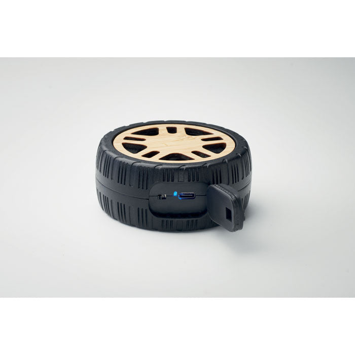Branded Tyre Shaped Wireless Speaker in use