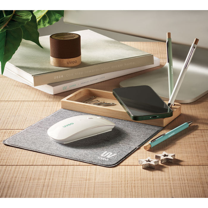 Branded All in 1 Bamboo Desk Organiser Phone Charger in use