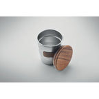 Branded Steel Tumbler with Walnut Grip in use
