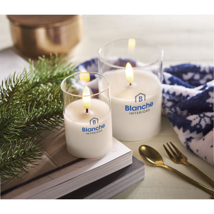 Branded LED Wax Candle in Glass Holder in use