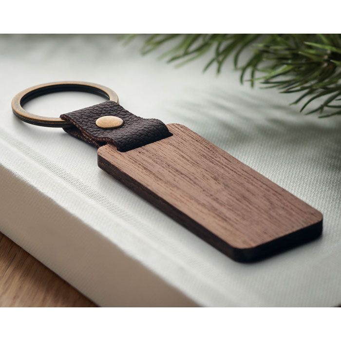 Branded Walnut and PU Key Ring in use