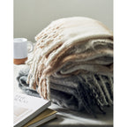 Branded Chequered Mohair Feel Blanket in use