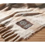 Branded Chequered Mohair Feel Blanket in use