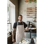 Branded Recycled Cotton Apron in Natural 180gsm in use