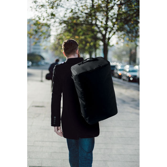 Branded Travel Tarpaulin Duffle Bag in use
