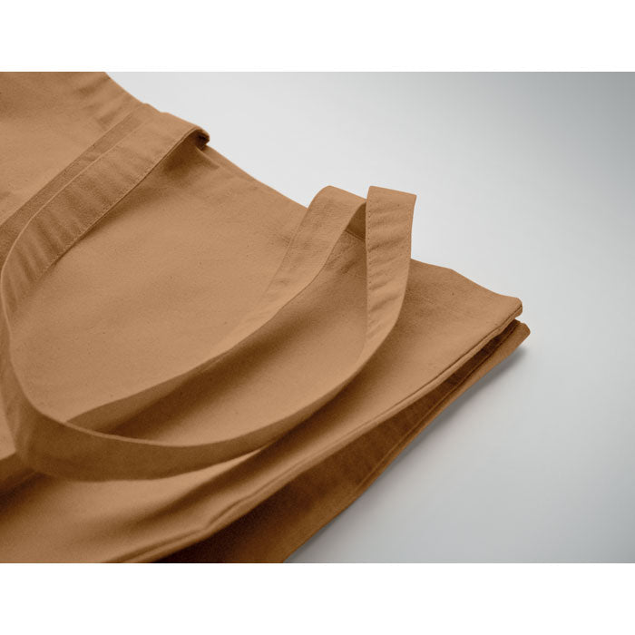 Branded Shopping Bag Fairtrade 180gsm 38 x 12 x 42cm in use