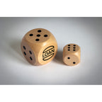 Branded Schima Wood Dice - 3cm in use