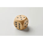 Branded Schima Wood Dice - 5cm in use