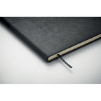 Branded A5 Soft PU Notebook with Metal Detail in use