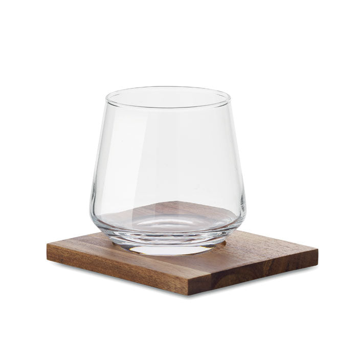 Branded whisky glass with wooden coaster