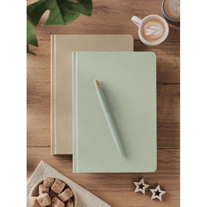 Branded A5 Sugarcane Paper Notebook in use