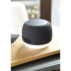 Branded Wireless Speaker with Charger and Mood Light in use