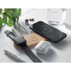 Branded Bamboo 3 in 1 Wireless Charging Station in use