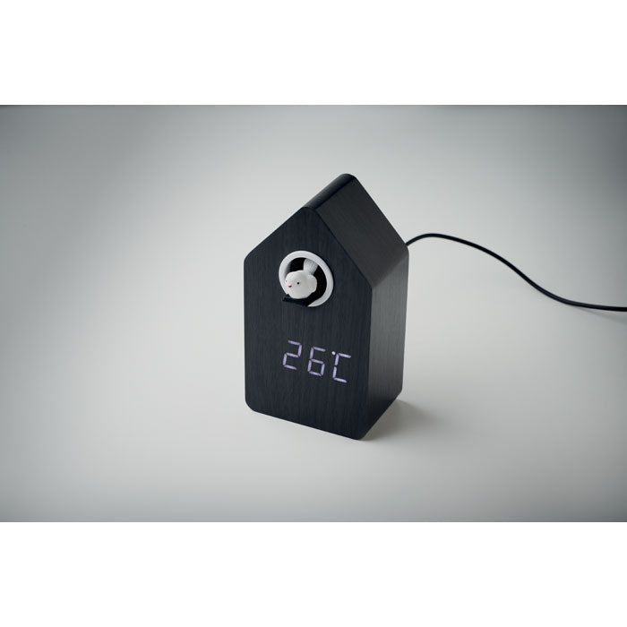 Branded MDF Cuckoo Alarm Clock in use