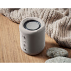 Branded ABS and RPET 5W Wireless Speaker in use