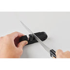 Branded Pocket Knife Sharpener in use