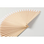 Branded Schima Wood Hand Fan with 34 Ribs in use