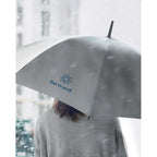 Branded 23 Inch Reflective Umbrella in use