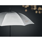 Branded 23 Inch Reflective Umbrella in use