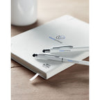 Branded A5 Antibacterial Notebook in use