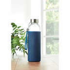 Branded glass bottle, in use